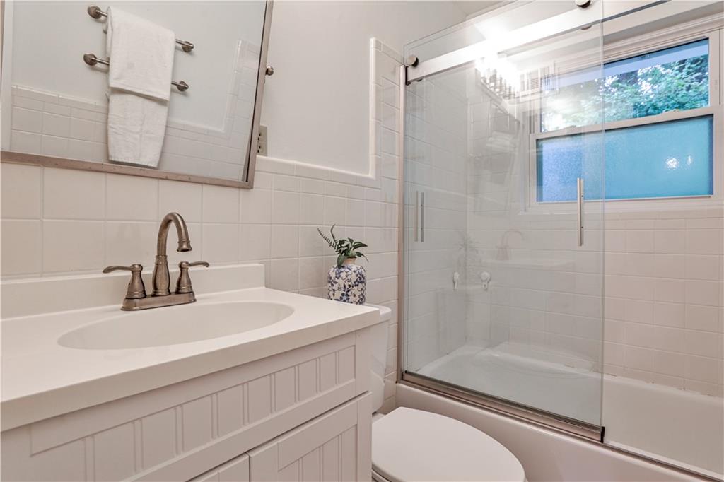 1010 Greenbriar Circle Decatur, GA 30033 - Photo 15 of 28 a bathroom with a sink toilet and shower