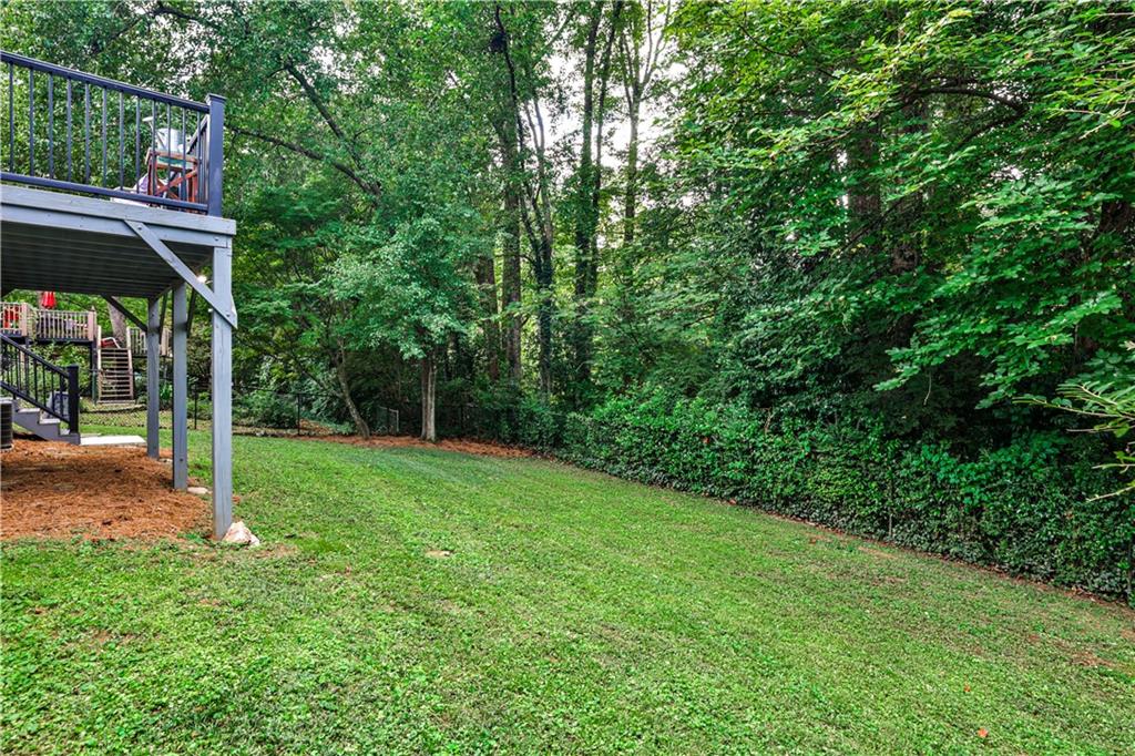 1010 Greenbriar Circle Decatur, GA 30033 - Photo 19 of 28 a view of backyard with green space and deck