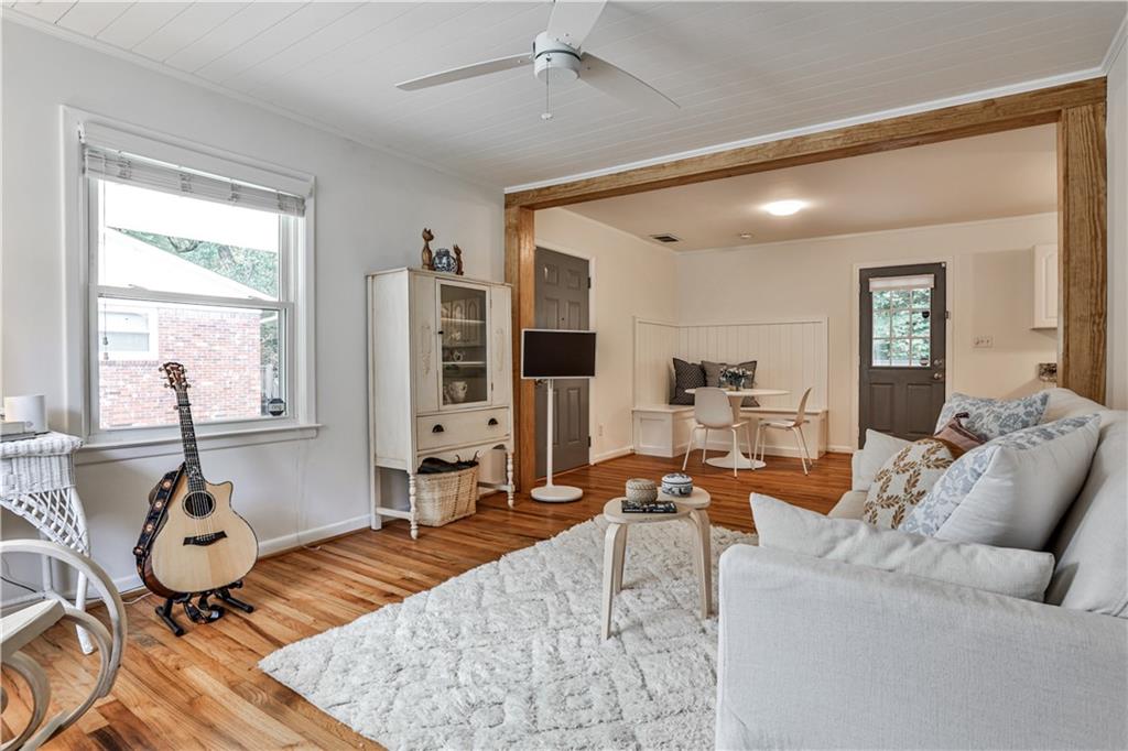 1010 Greenbriar Circle Decatur, GA 30033 - Photo 2 of 28 a living room with furniture and wooden floor