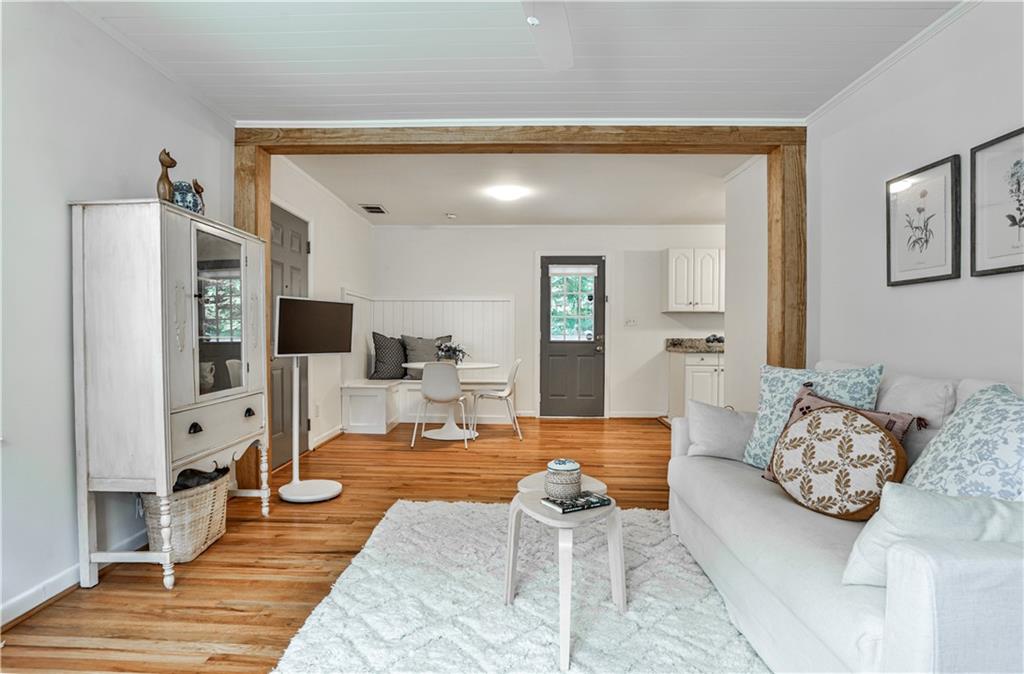 1010 Greenbriar Circle Decatur, GA 30033 - Photo 3 of 28 a living room with furniture and a wooden floor