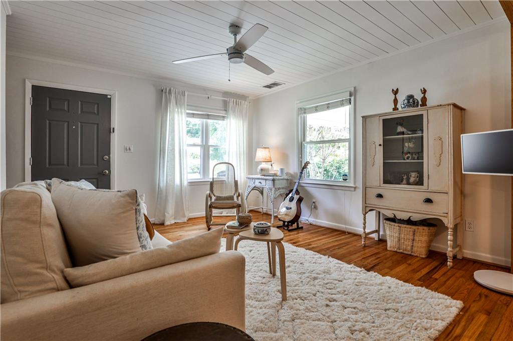 1010 Greenbriar Circle Decatur, GA 30033 - Photo 6 of 28 a living room with furniture or couch and a wooden floor
