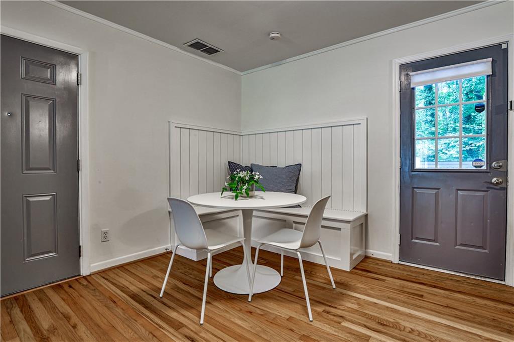 1010 Greenbriar Circle Decatur, GA 30033 - Photo 7 of 28 a dining room with furniture window and wooden floor