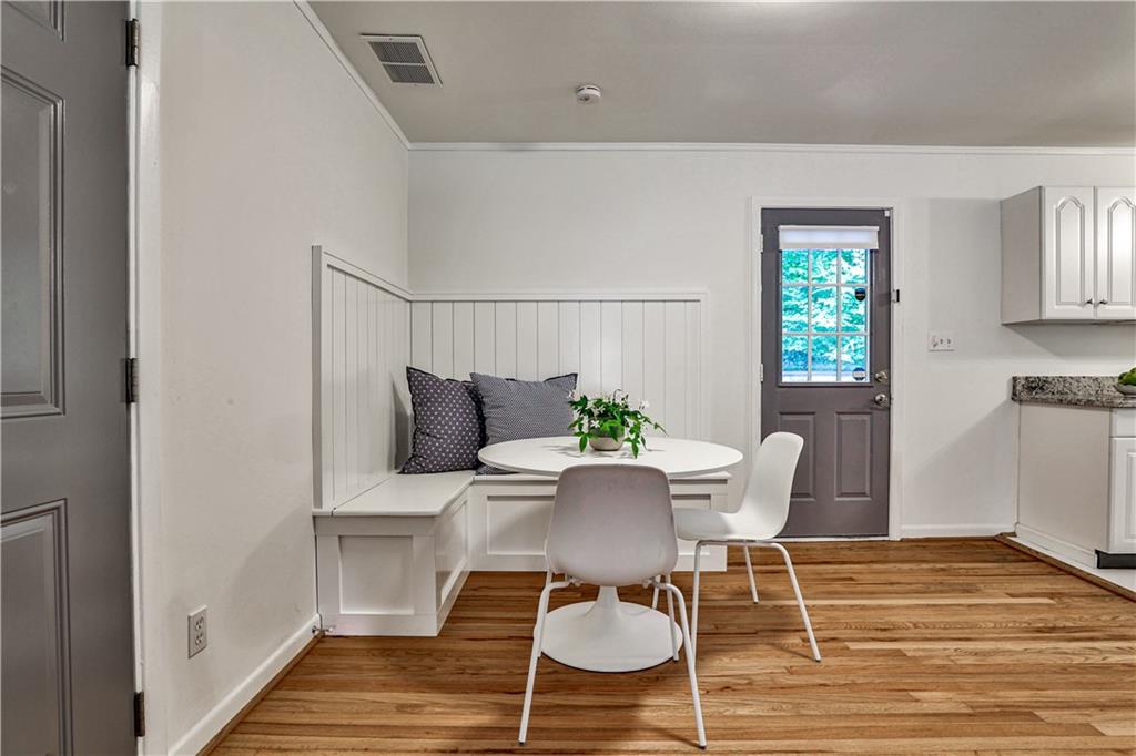 1010 Greenbriar Circle Decatur, GA 30033 - Photo 8 of 28 a view of a dining room with furniture window and wooden floor