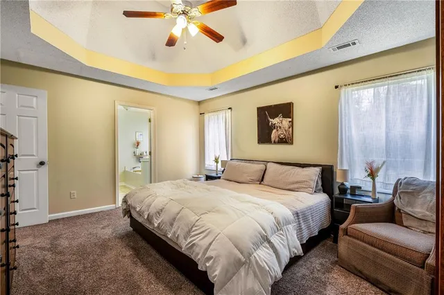 a bed room with a bed and a couch