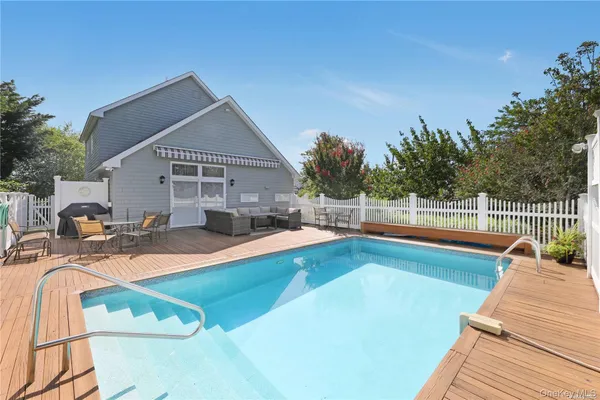 a view of a house with swimming pool