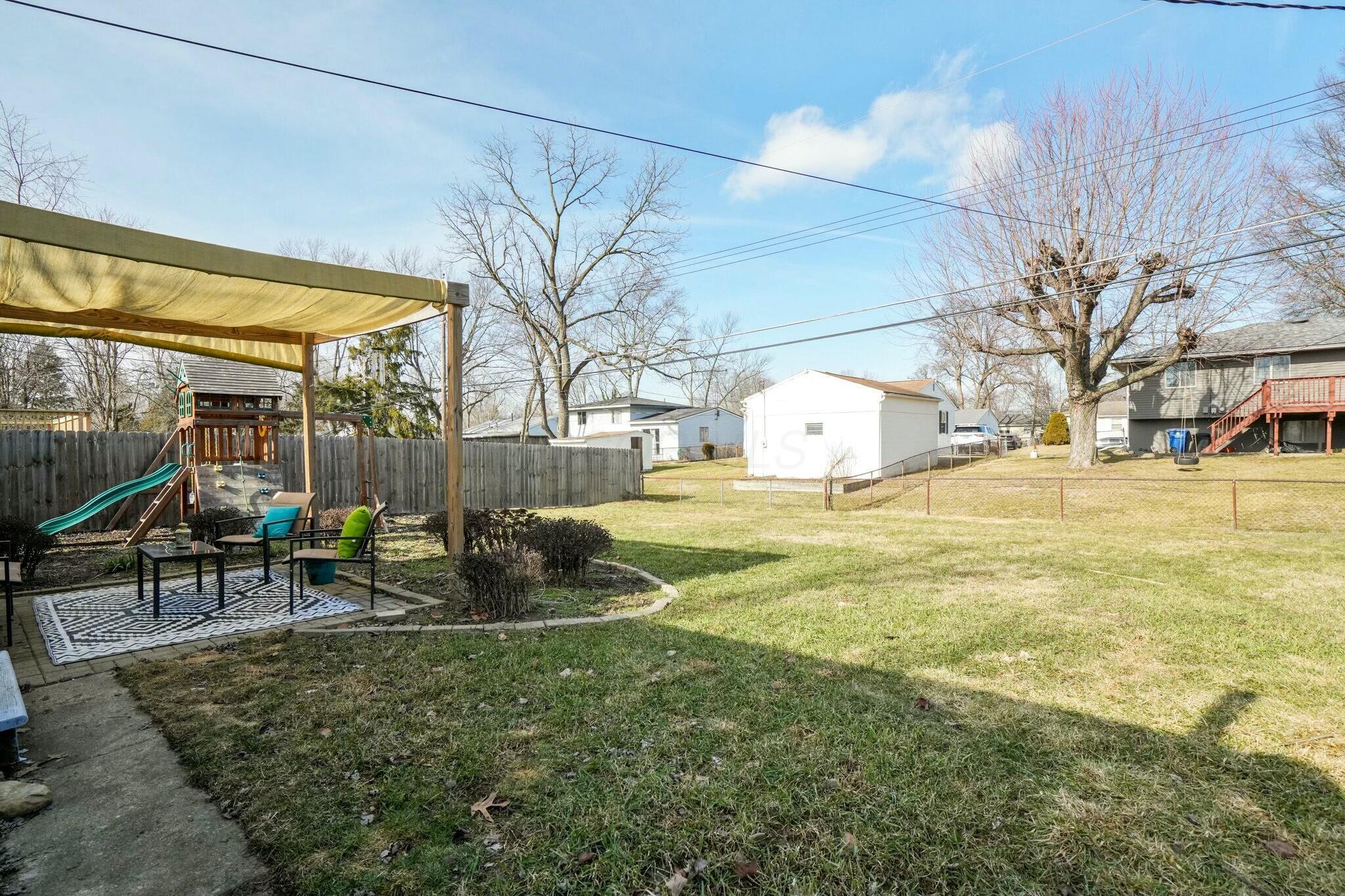 3510 Dempsey Road Westerville, OH 43081 - Photo 33 of 39 Patio with Playset and Fenced Yard