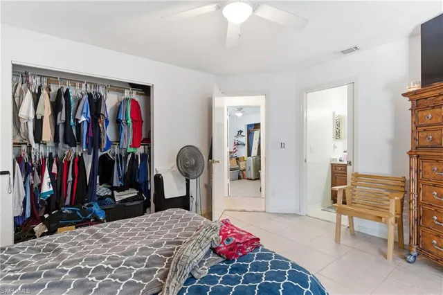 a bathroom with a sink vanity mirror and toilet