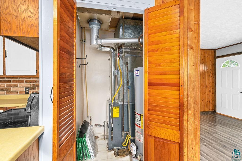 66 Banks Boulevard Silver Bay, MN 55614 - Photo 8 of 19 Utility room featuring water heater