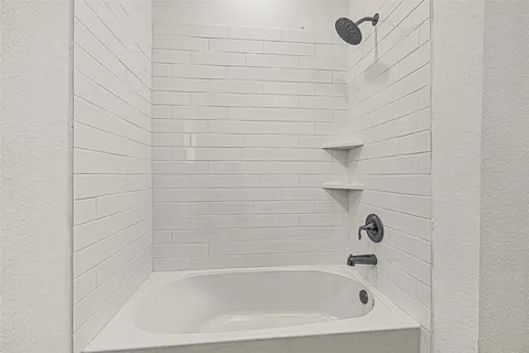 a close up of a bathtub curtain