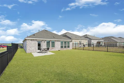 a front view of a house with swimming pool