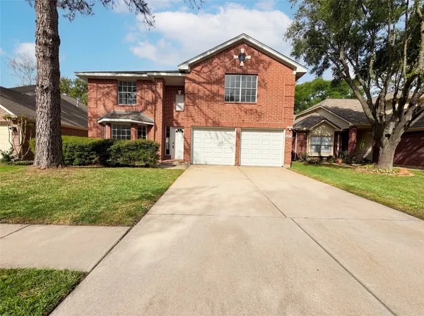 a front view of house with yard