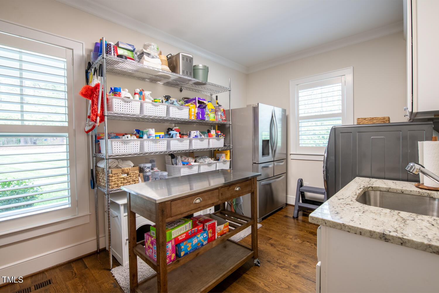 304 Dublin Road Raleigh, NC 27609 - Photo 14 of 61 Oversized Pantry/Laundry off the Kitchen for extra convenience