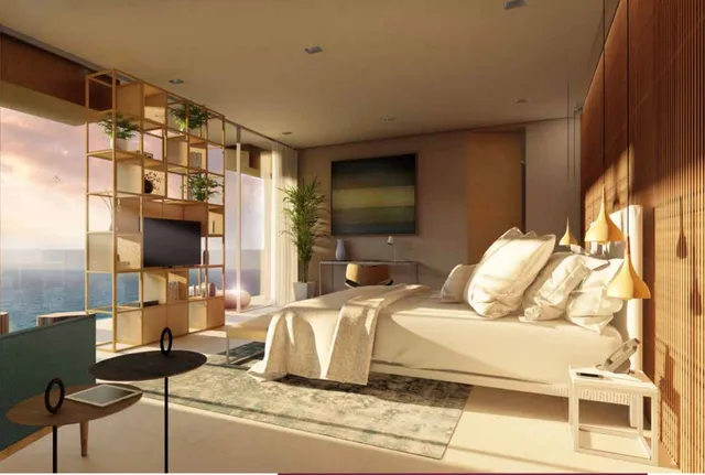 a bedroom with a bed and glass door