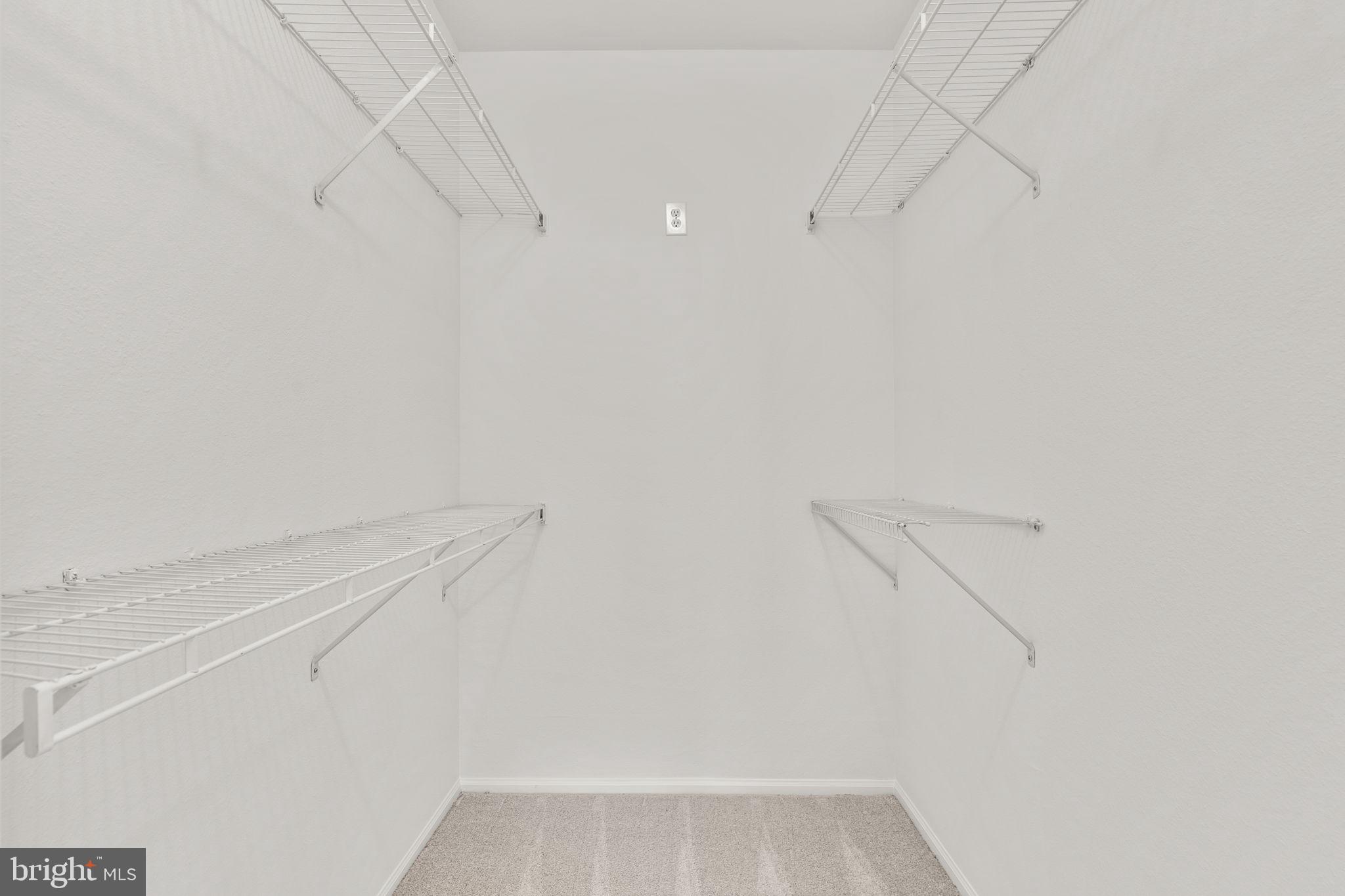 1570 Spring Gate Dr., Unit 7303 McLean, VA 22102 - Photo 18 of 25 a view of a room with racks on the wall