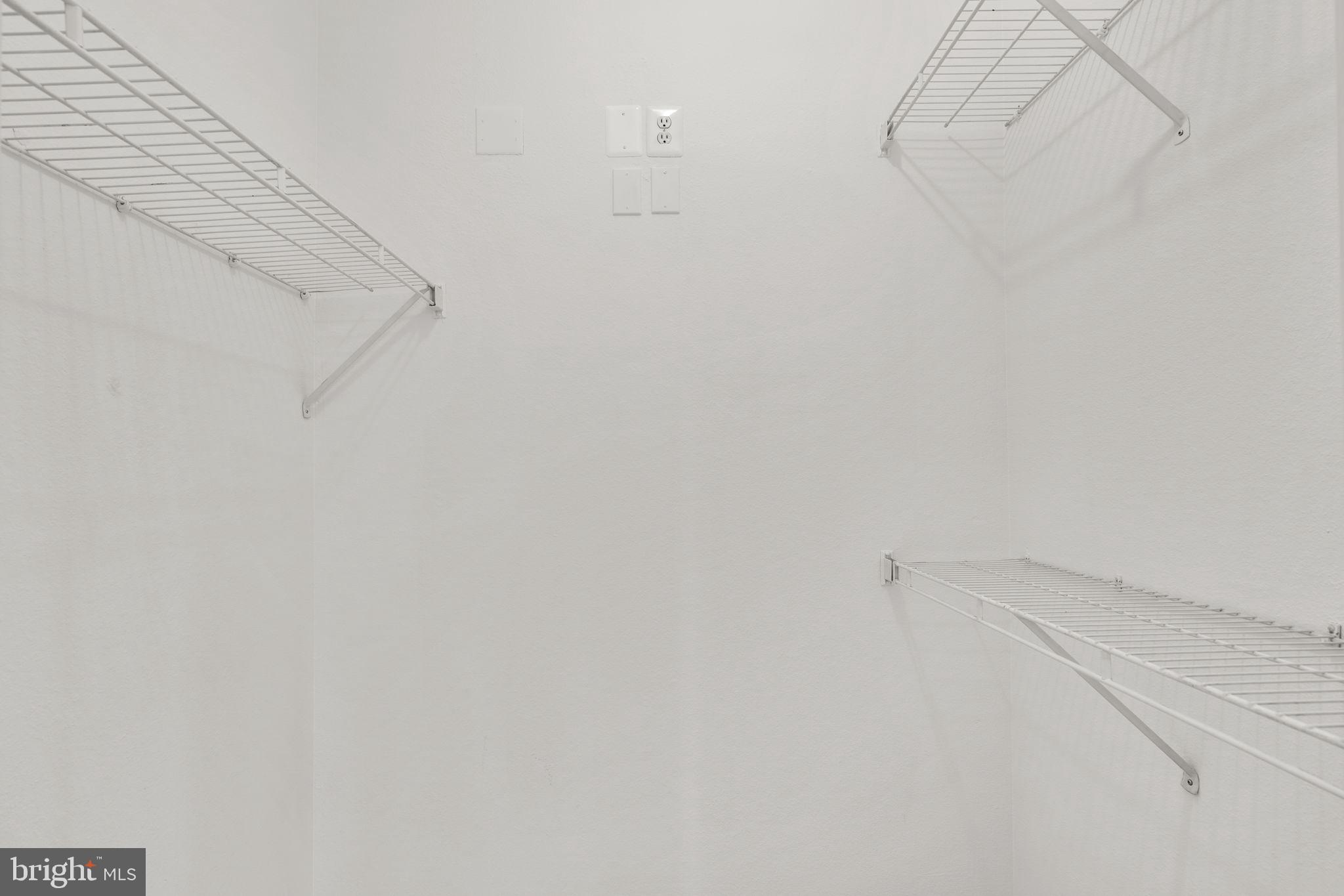 1570 Spring Gate Dr., Unit 7303 McLean, VA 22102 - Photo 21 of 25 a view of small space with racks on the wall