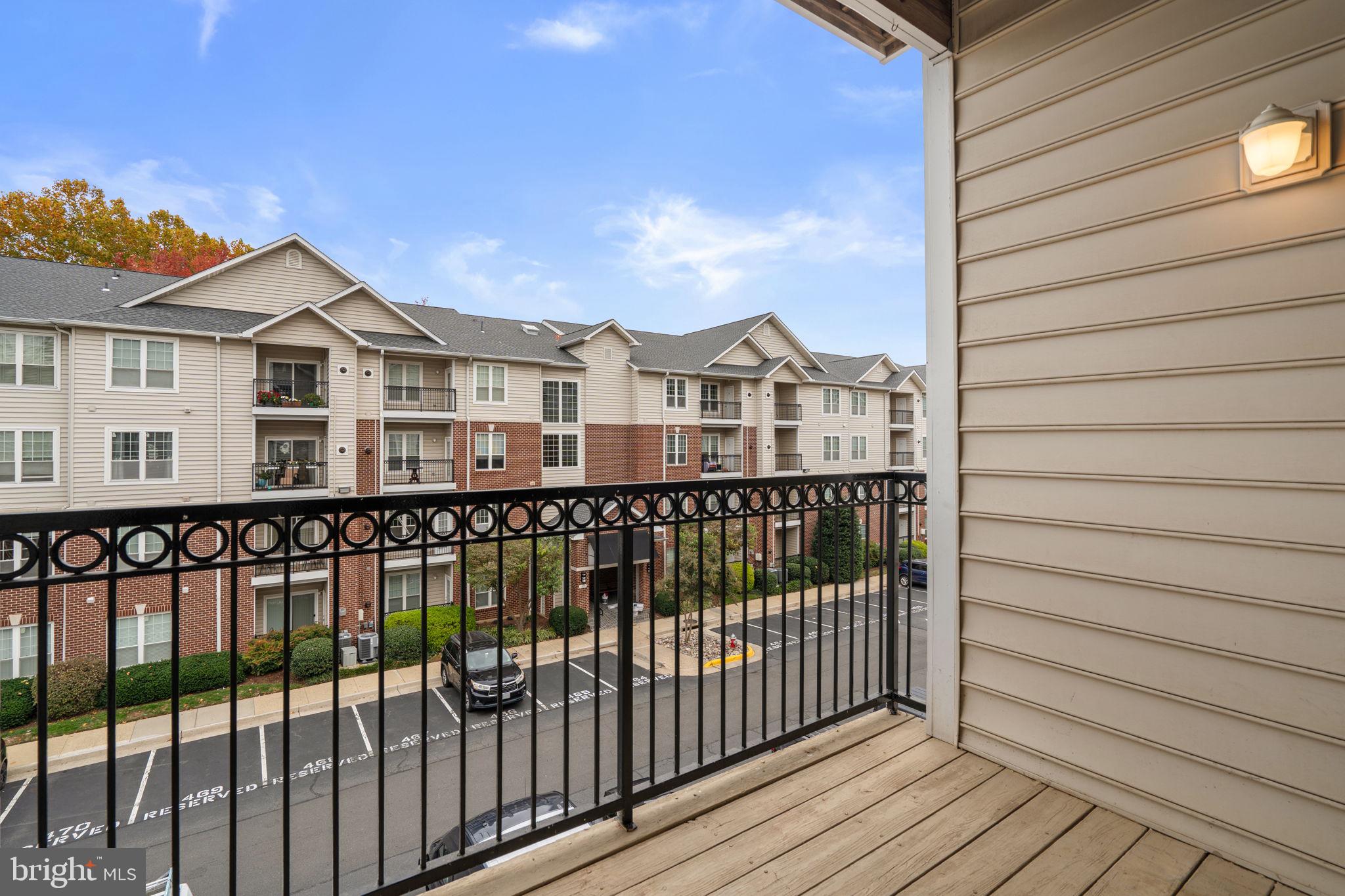 1570 Spring Gate Dr., Unit 7303 McLean, VA 22102 - Photo 24 of 25 a view of a houses with a balcony