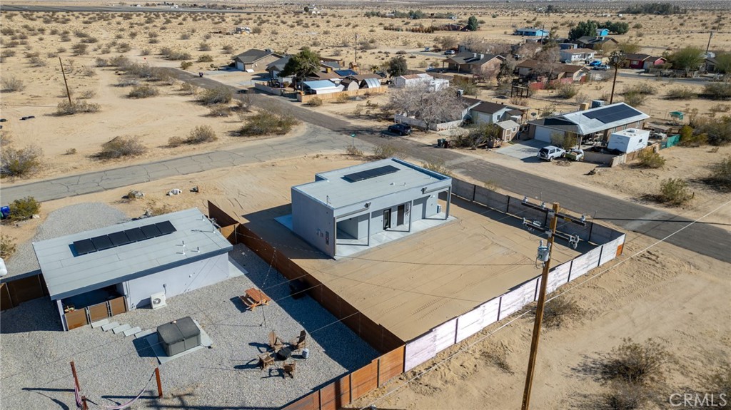 5090 1st Street East Joshua Tree, CA 92252 - Photo 10 of 12 an aerial view of a house with a mountain