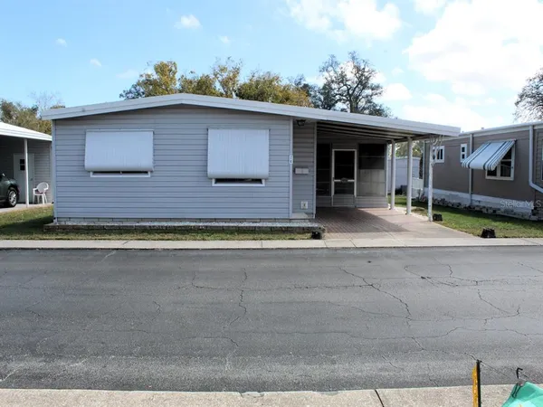 a view of a house with a patio