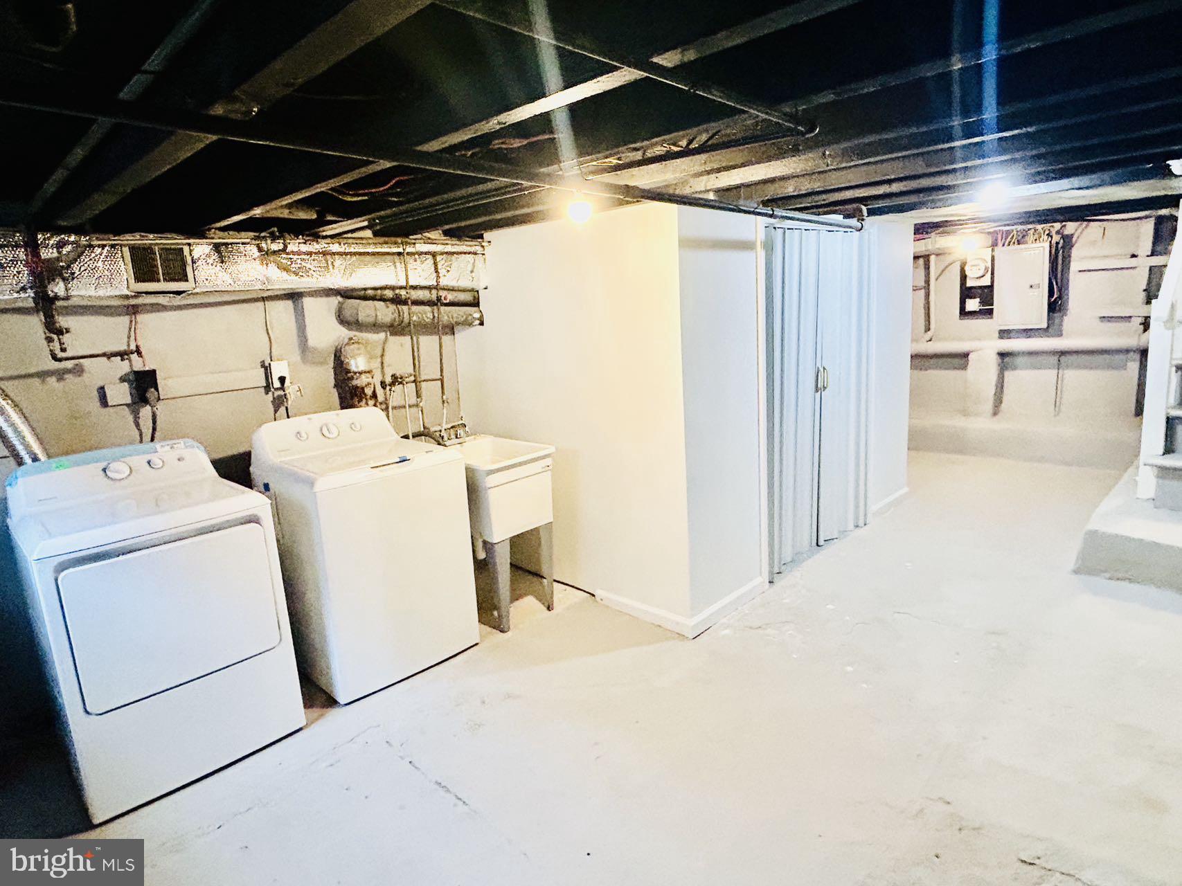 2013 South Bouvier Street Philadelphia, PA 19145 - Photo 15 of 18 a view of storage and utility room with washer and dryer