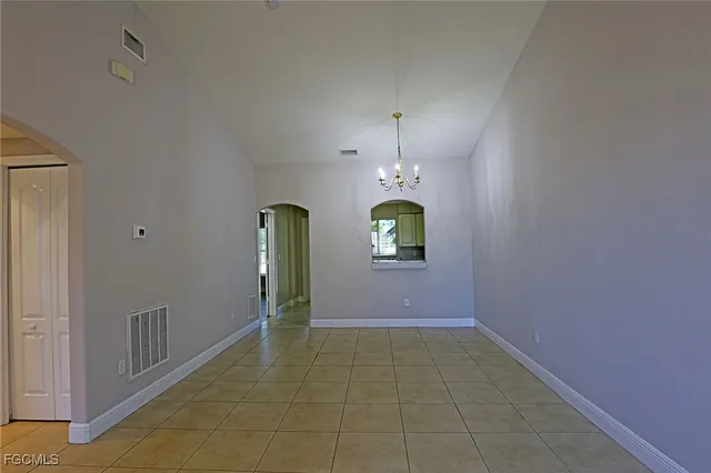 a view of a hallway with a window