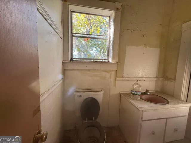 a kitchen with a stove and a fireplace