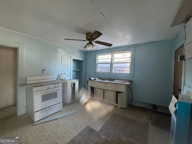 a bathroom with a toilet and a sink