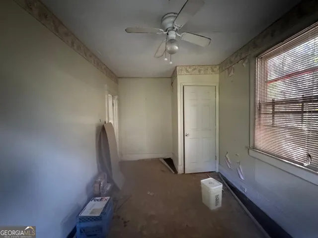 a view of a city from a hallway