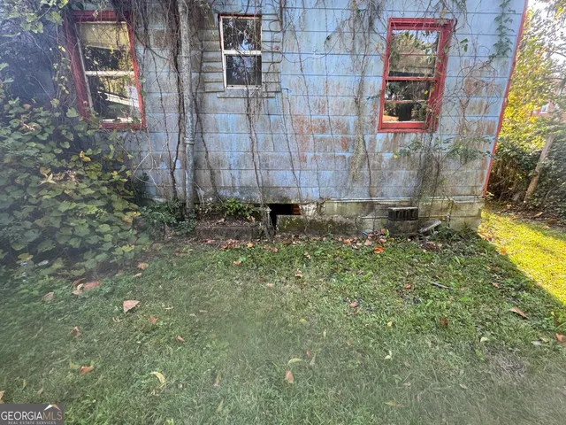 a backyard of a house with lots of green space