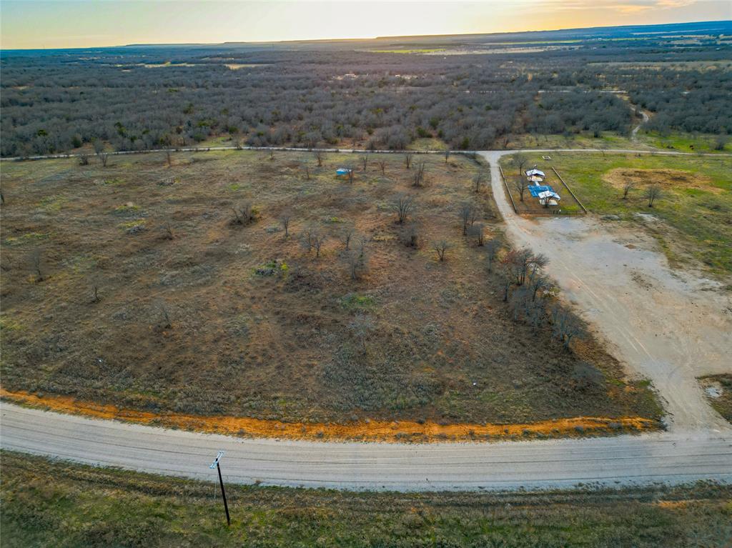 Lot 40 Paradise Oaks Ranch Perrin, TX 76486 - Photo 4 of 12 a view of yard with ocean view