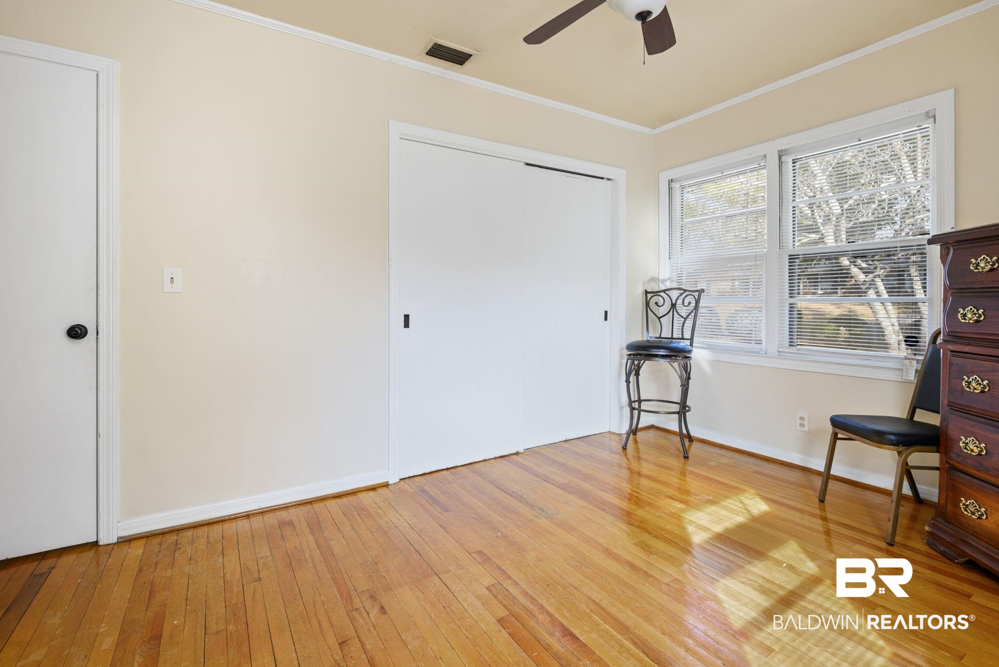 4105 Libby Drive Mobile, AL 36693 - Photo 15 of 26 Interior space with ceiling fan, ornamental molding, and light wood-type flooring