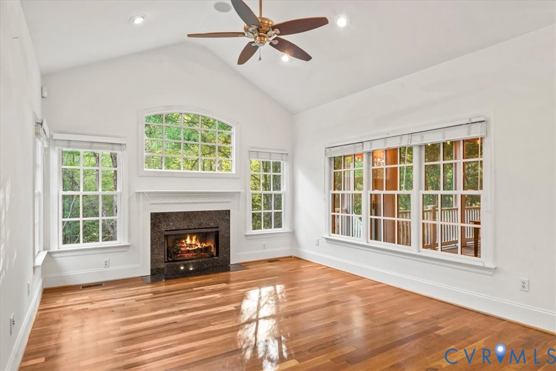 3308 Yarding Way Toano, VA 23168 - Photo 39 of 83 a view of an empty room with wooden floor and a window