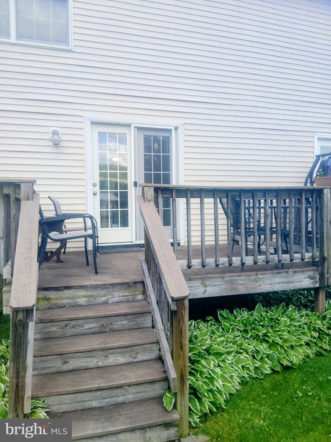 69 Johnson Smithsburg, MD 21783 - Photo 8 of 39 a view of backyard with deck and wooden floor