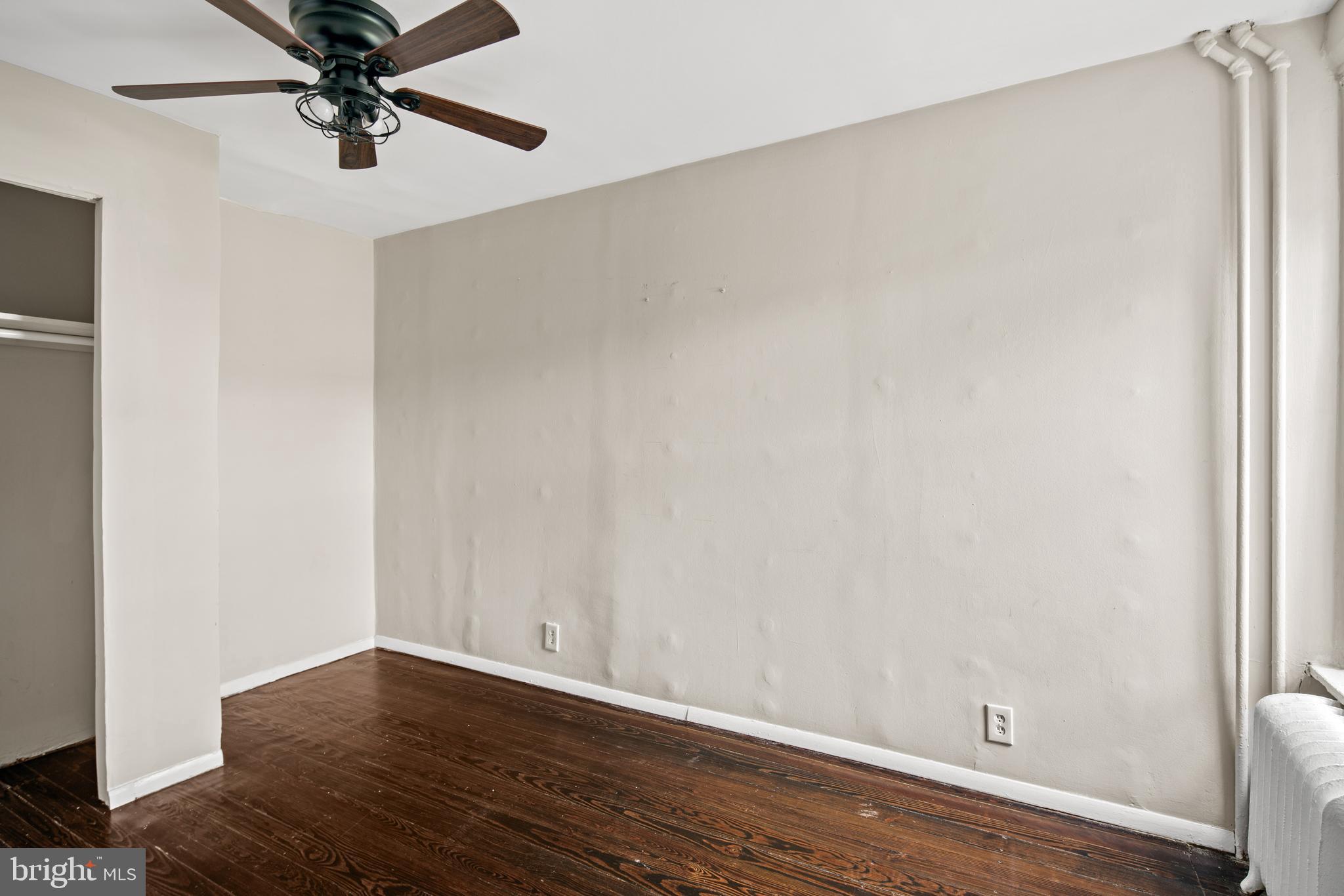 127 Seville Street Philadelphia, PA 19127 - Photo 14 of 23 a view of a livingroom with wooden floor and a ceiling fan