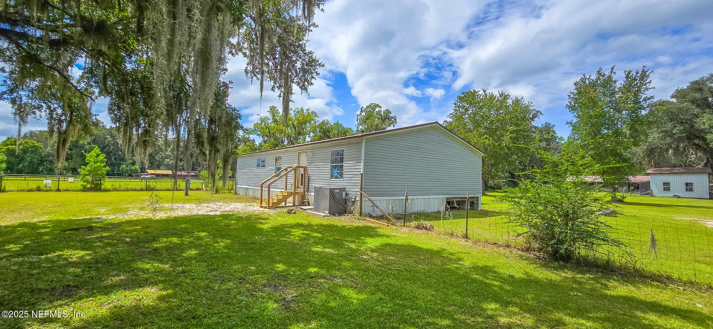 11325 Young Road, Unit # 1 Jacksonville, FL 32218 - Photo 3 of 32 Back of home