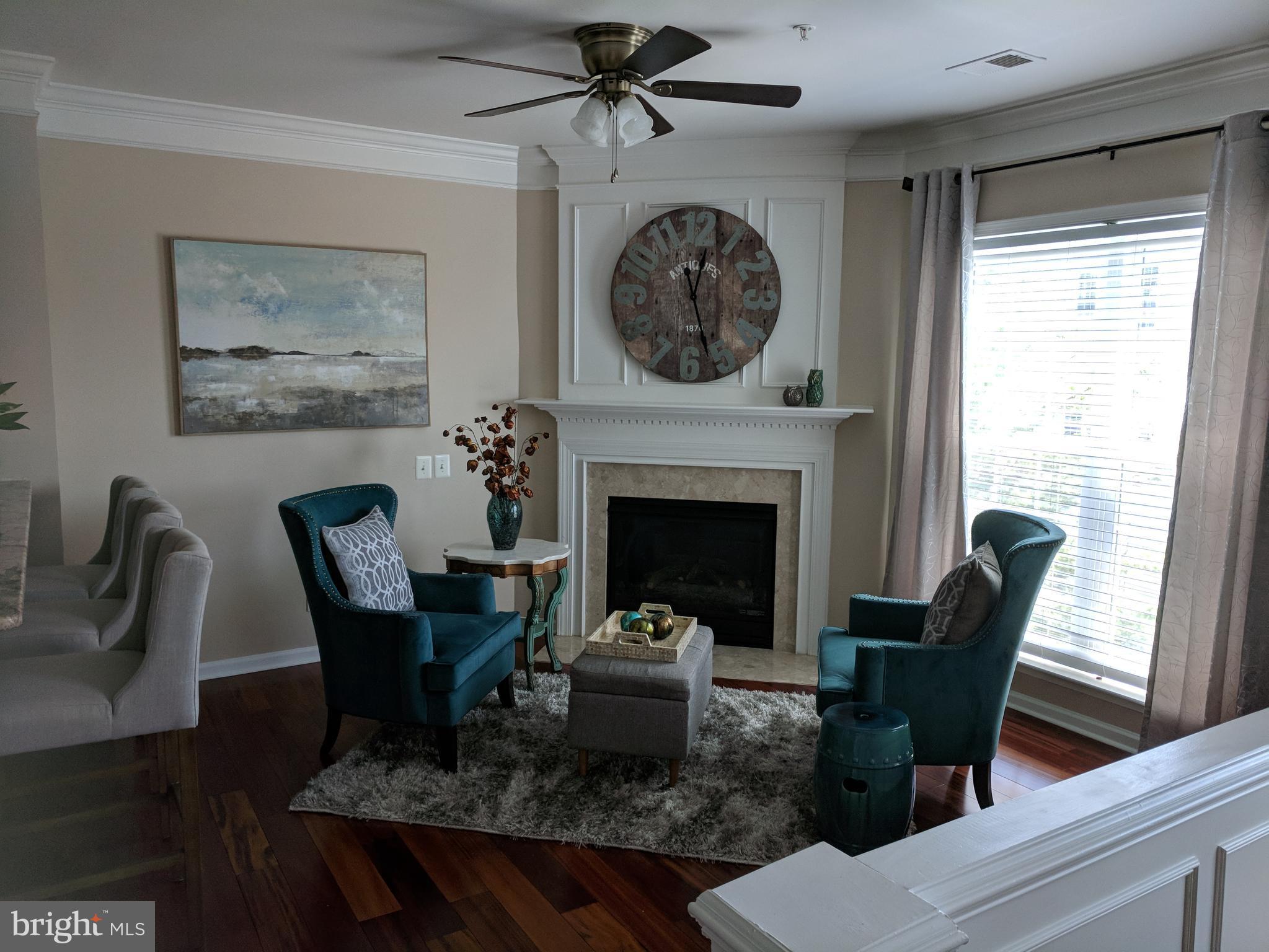 6325 Eagle Ridge Lane, Unit C Alexandria, VA 22312 - Photo 6 of 27 Den with gas fireplace