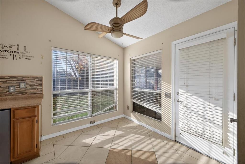 920 Danforth Place Arlington, TX 76017 - Photo 11 of 28 a view of empty room with wooden floor and fan