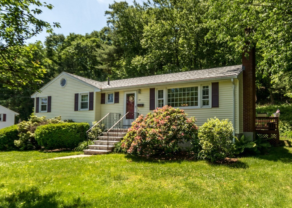 166 Totten Pond Road Waltham, MA 02451 - Photo 2 of 29 a front view of house with yard and green space