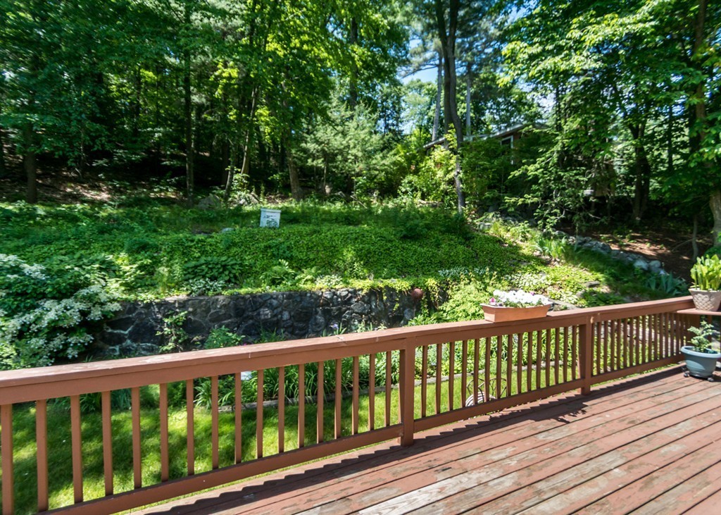 166 Totten Pond Road Waltham, MA 02451 - Photo 23 of 29 a view of a wooden roof deck