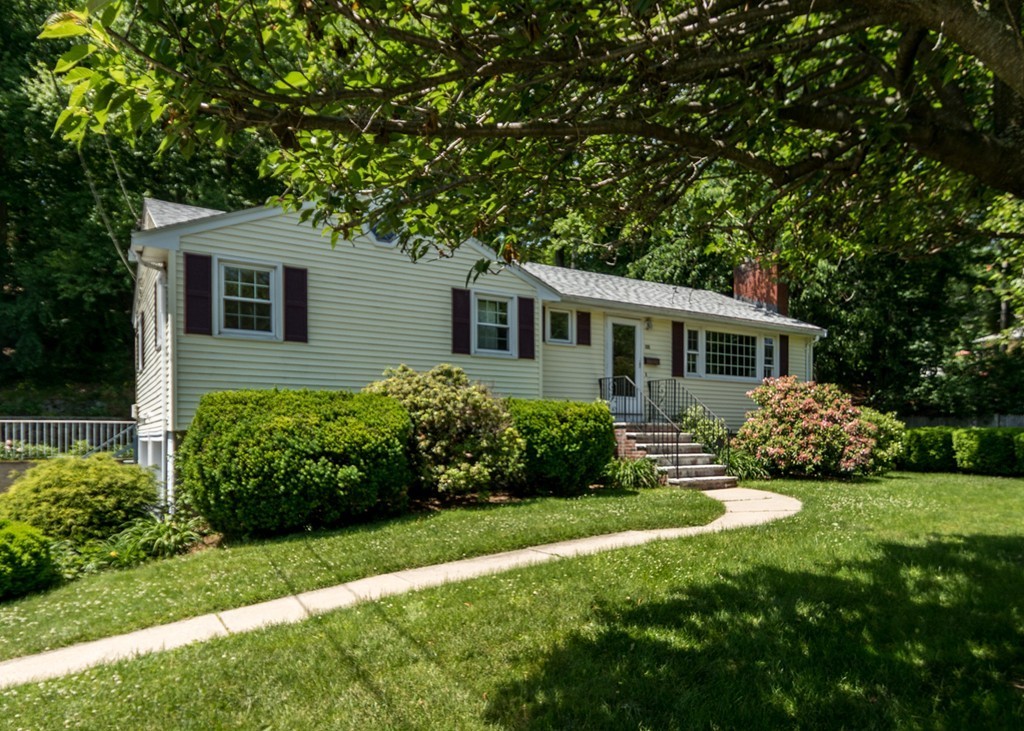 166 Totten Pond Road Waltham, MA 02451 - Photo 3 of 29 a front view of house with yard and green space