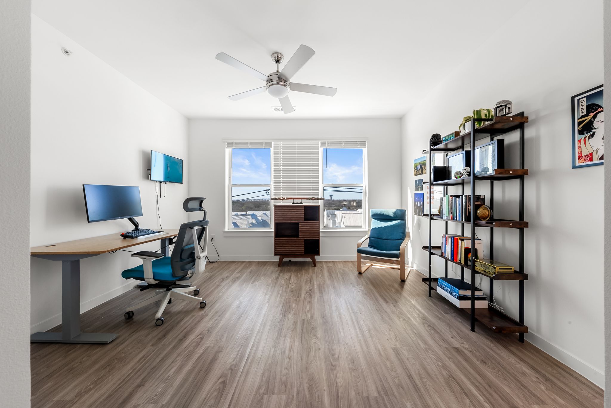 4801 Springdale Road, Unit 2410 Austin, TX 78723 - Photo 25 of 33 a view of a livingroom with workspace and a window