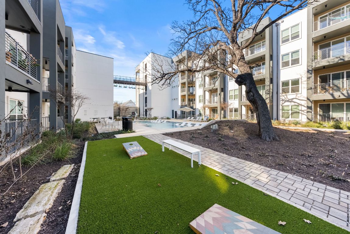 4801 Springdale Road, Unit 2410 Austin, TX 78723 - Photo 29 of 33 Amazing Gravity ATX amenities! Large pool, dog spa, cornhole, and more!