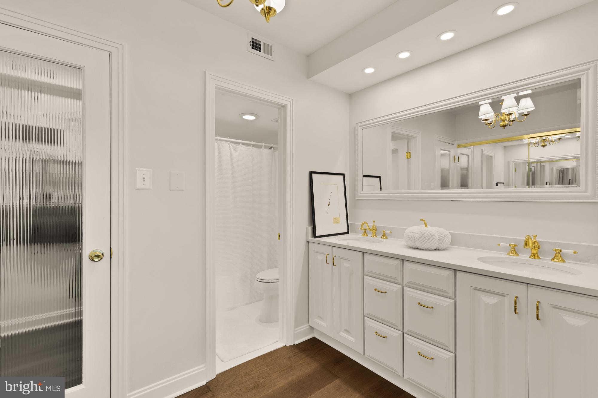 4550 North Park Avenue, Unit 614 Chevy Chase, MD 20815 - Photo 14 of 26 En-suite primary bathroom boasts dual vanity