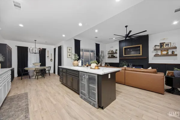 a spacious bathroom with a double vanity sink and a mirror