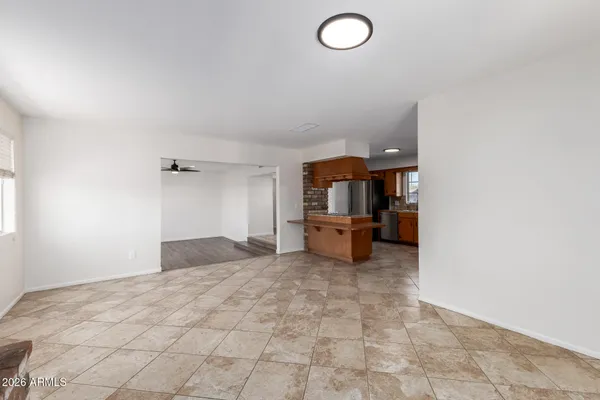 a stove top oven sitting inside of a kitchen
