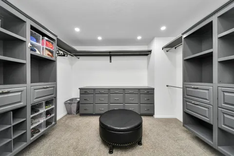 a view of an empty walk in closet