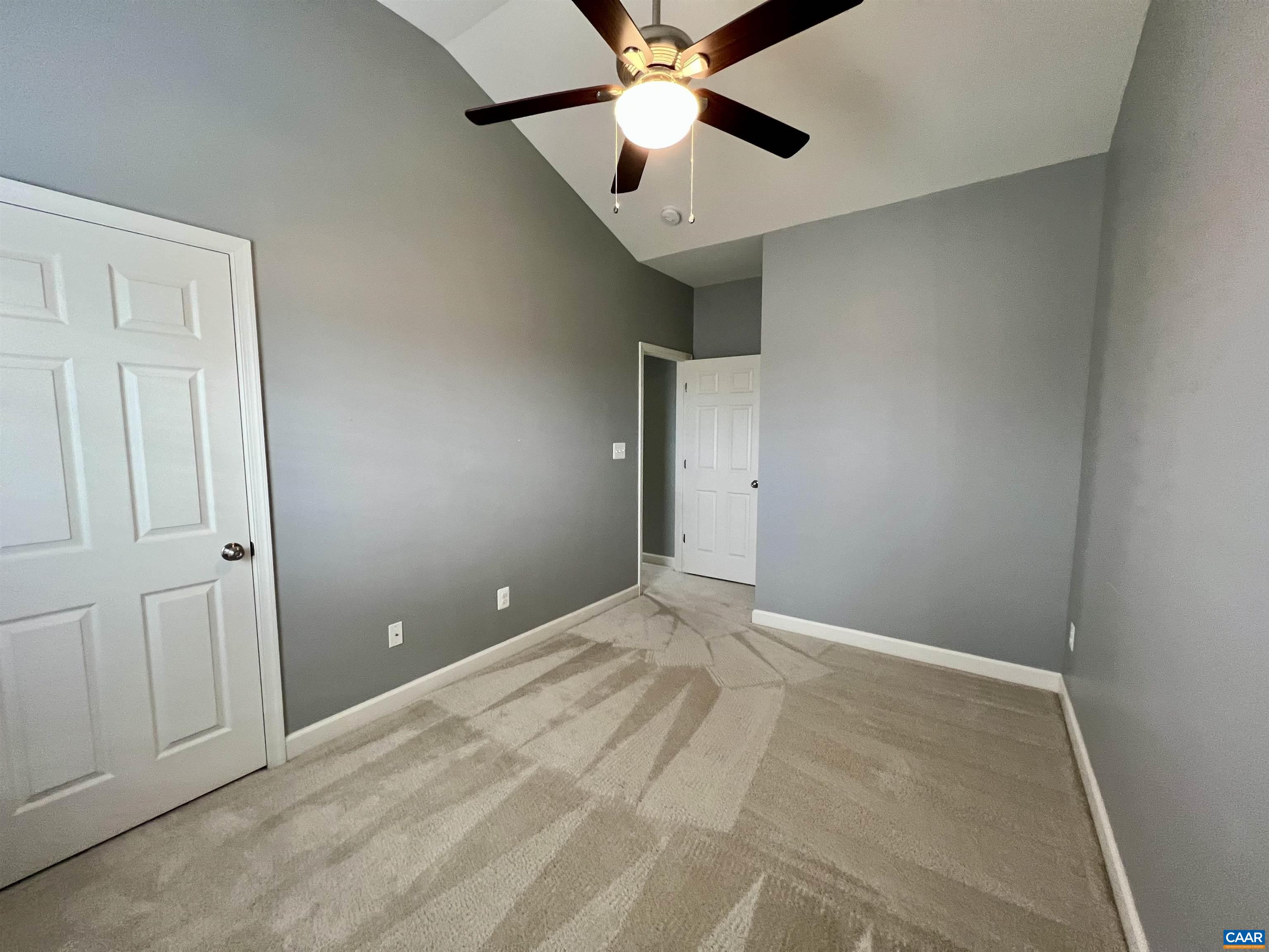 2545 Avemore Pond Road Charlottesville, VA 22911 - Photo 11 of 17 a view of an empty room and chandelier fan