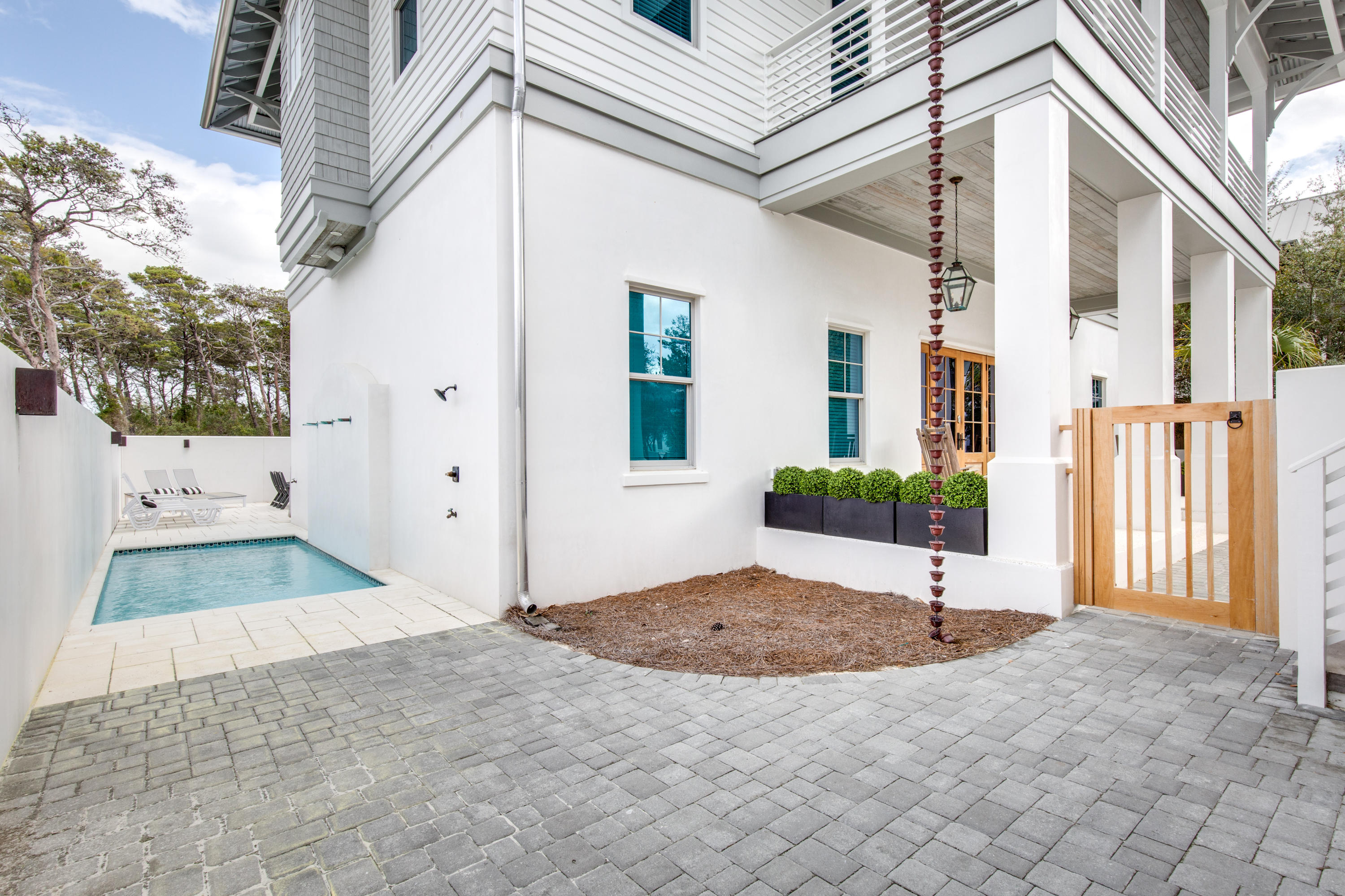 94 Pine Crest Circle Rosemary Beach, FL 32461 - Photo 2 of 69 a view of front door and small yard