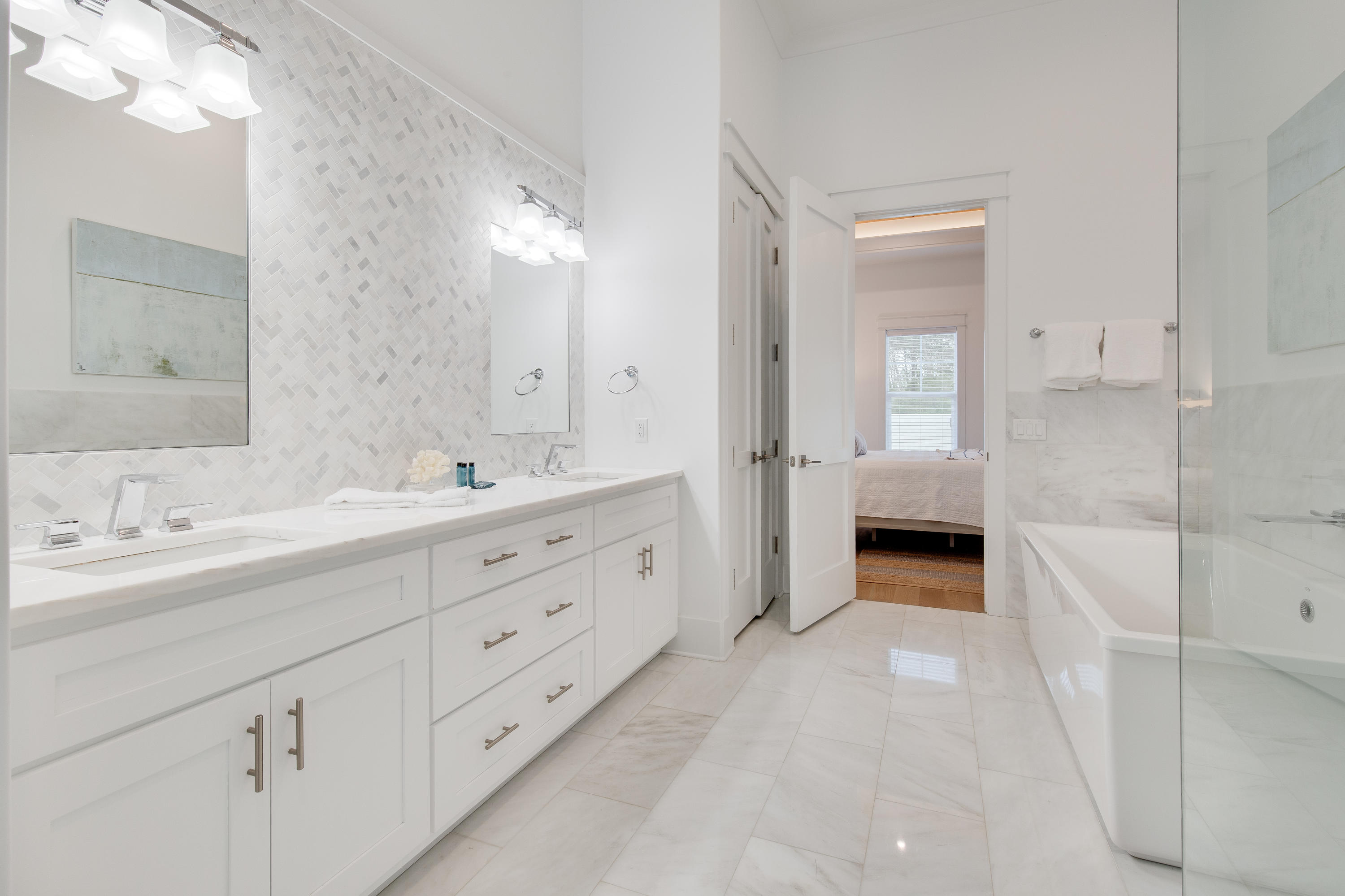 94 Pine Crest Circle Rosemary Beach, FL 32461 - Photo 23 of 69 a spacious bathroom with a double vanity sink mirror and