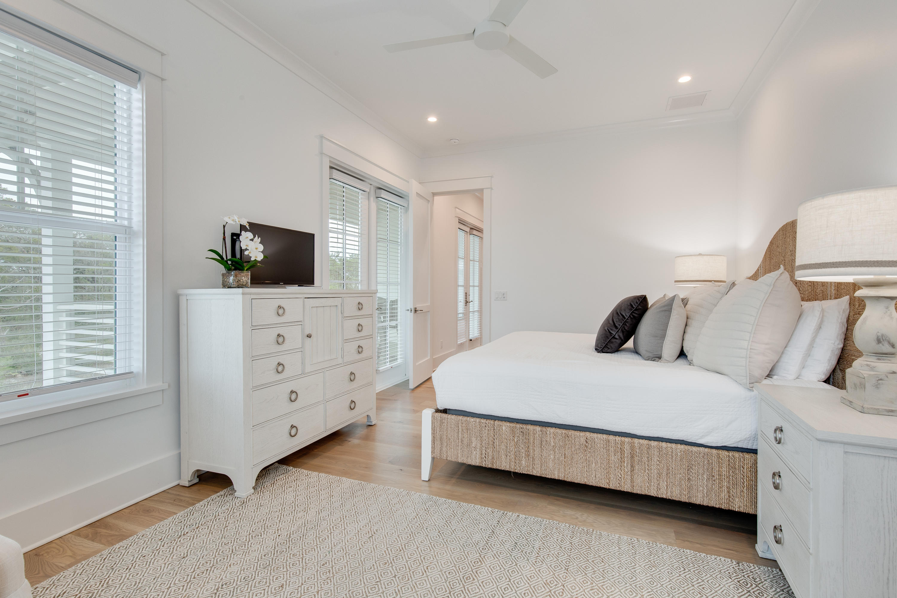 94 Pine Crest Circle Rosemary Beach, FL 32461 - Photo 29 of 69 a spacious bedroom with a bed and a flat screen tv