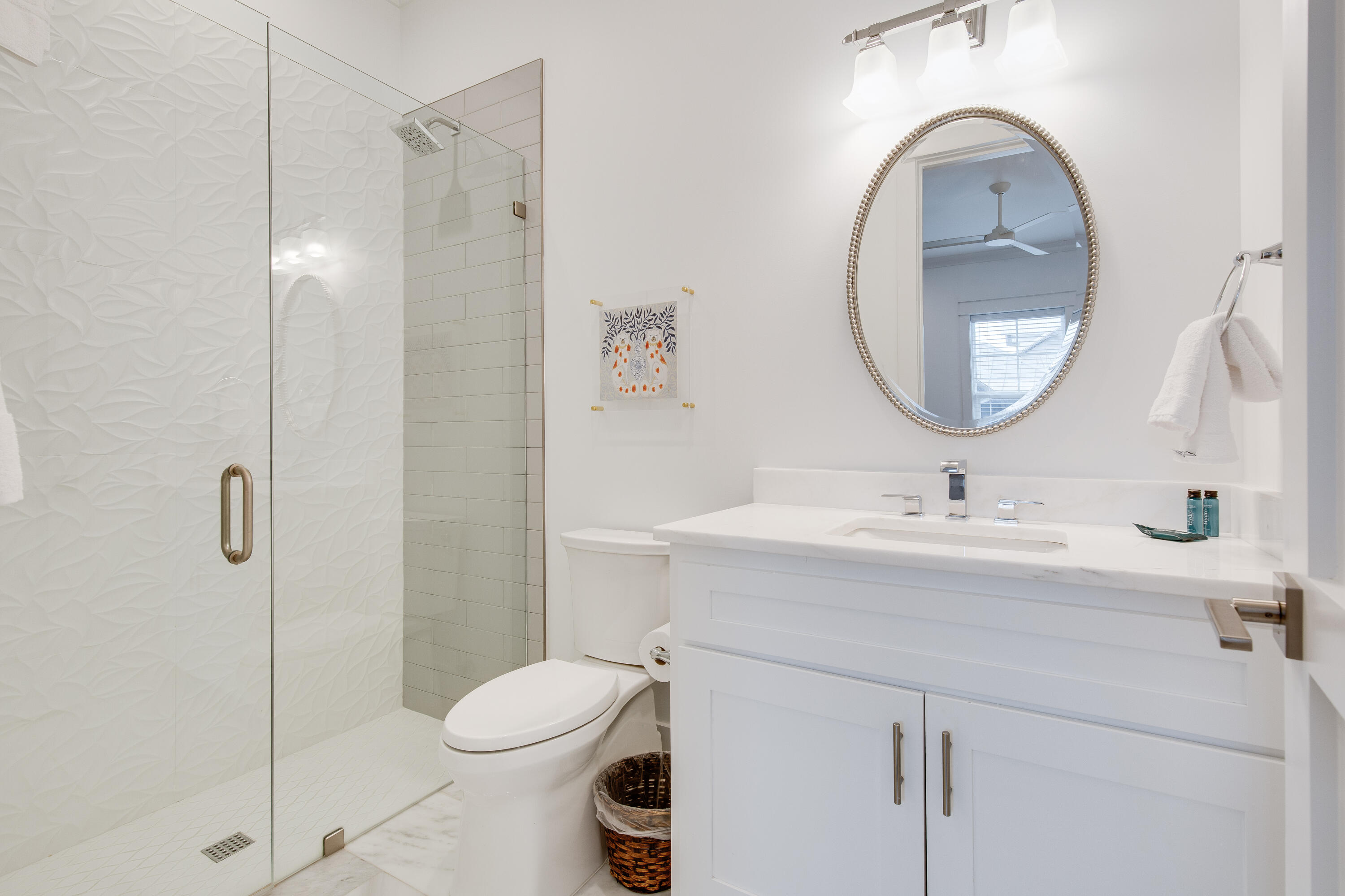 94 Pine Crest Circle Rosemary Beach, FL 32461 - Photo 36 of 69 a bathroom with a sink toilet and a mirror